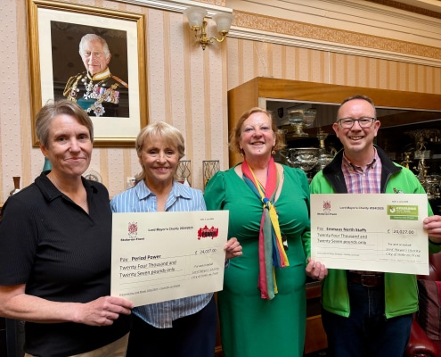 Cllr-Lyn-Sharpe-centre-with-charity-period-power-and-John-Webbe-of-Emmaus-North-Staffs