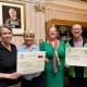 Cllr-Lyn-Sharpe-centre-with-charity-period-power-and-John-Webbe-of-Emmaus-North-Staffs