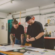 Rob-Fenton-and-Alastair-Barnett-working-behind-the-scenes-on-the-final-mural-plans-Credit-BeeBee-Creative