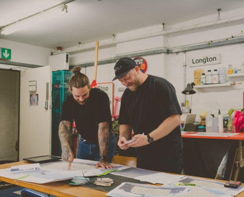 Rob-Fenton-and-Alastair-Barnett-working-behind-the-scenes-on-the-final-mural-plans-Credit-BeeBee-Creative